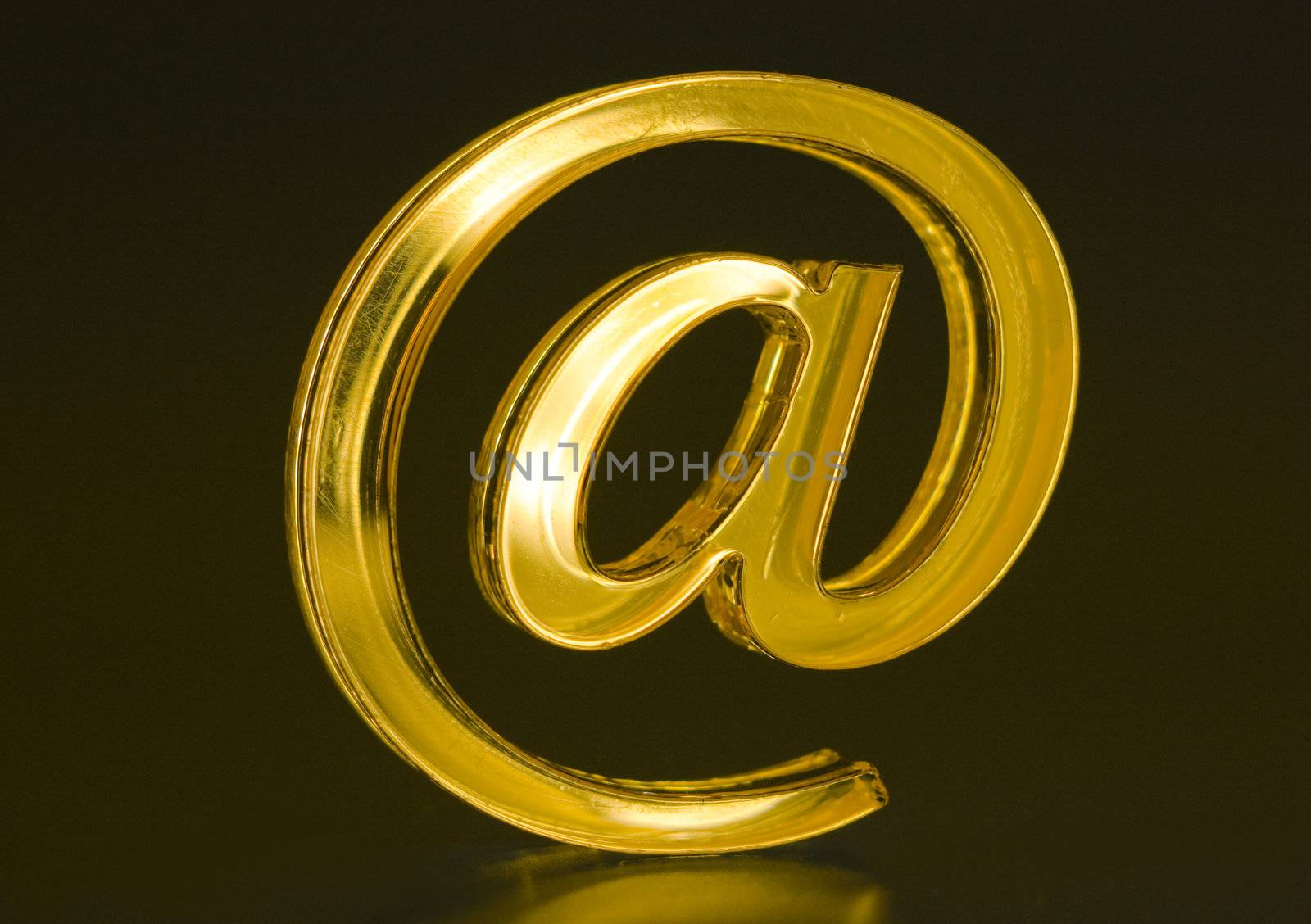 The Sign Email golden colour on dark background.