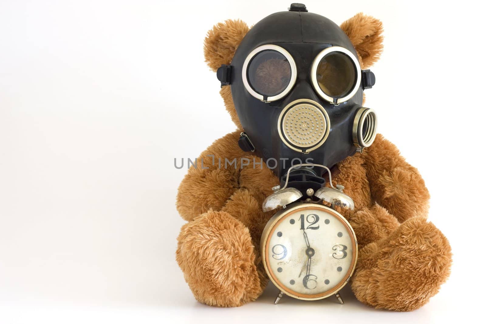 The Nursery toy, gas mask, old watch on white background.