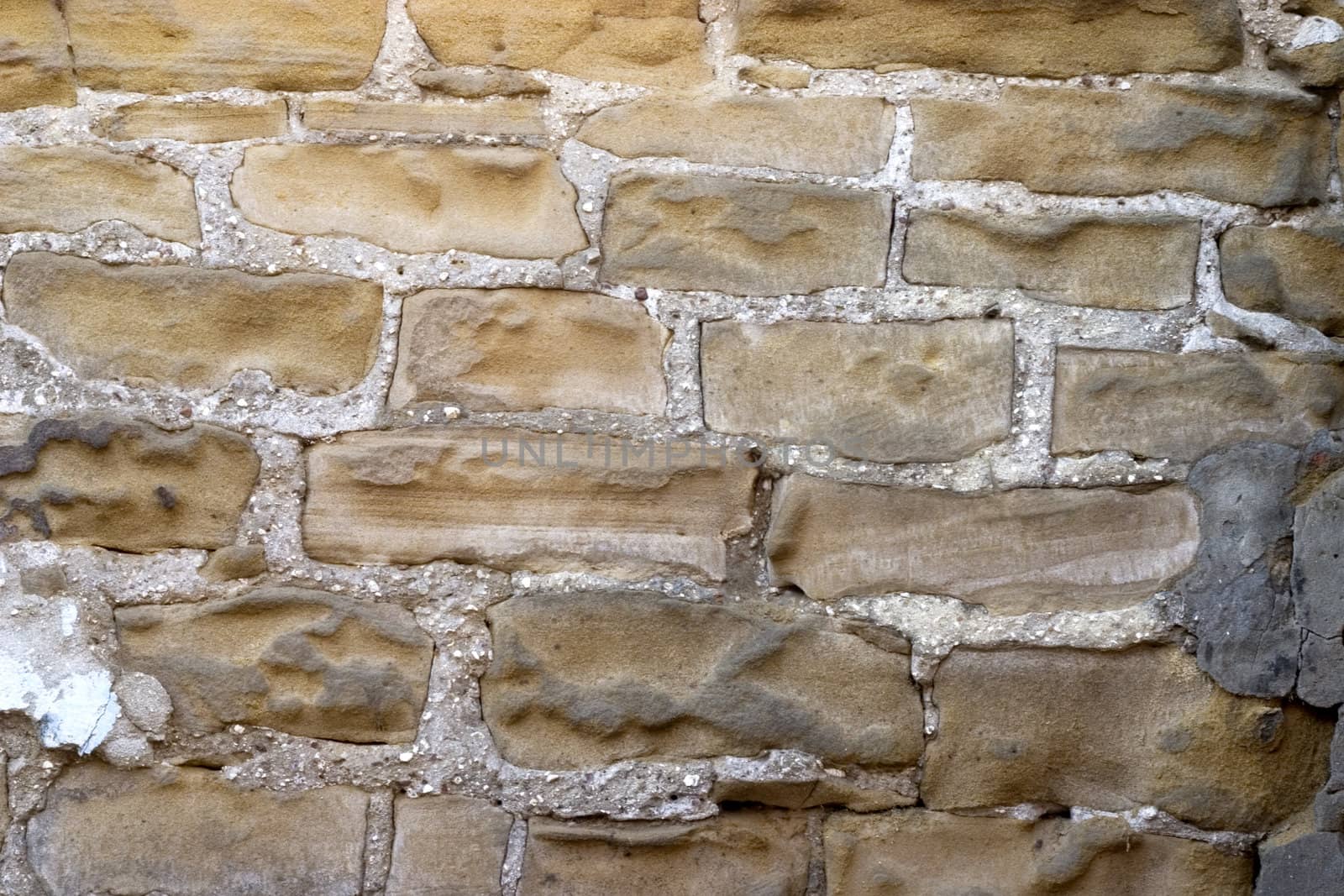 Old wall from a grey stone.