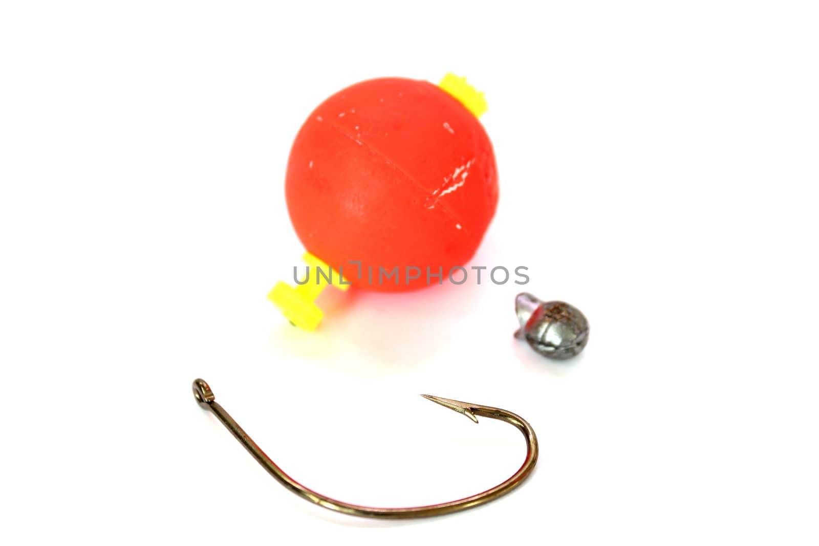 Isolated fishing gear including a hook, bobber, and sinker.