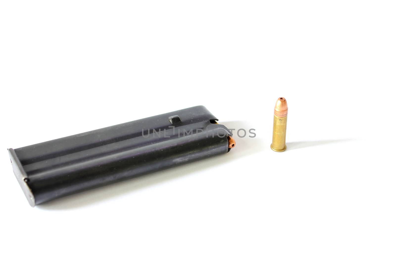 Isolated .22 caliber bullet with clip