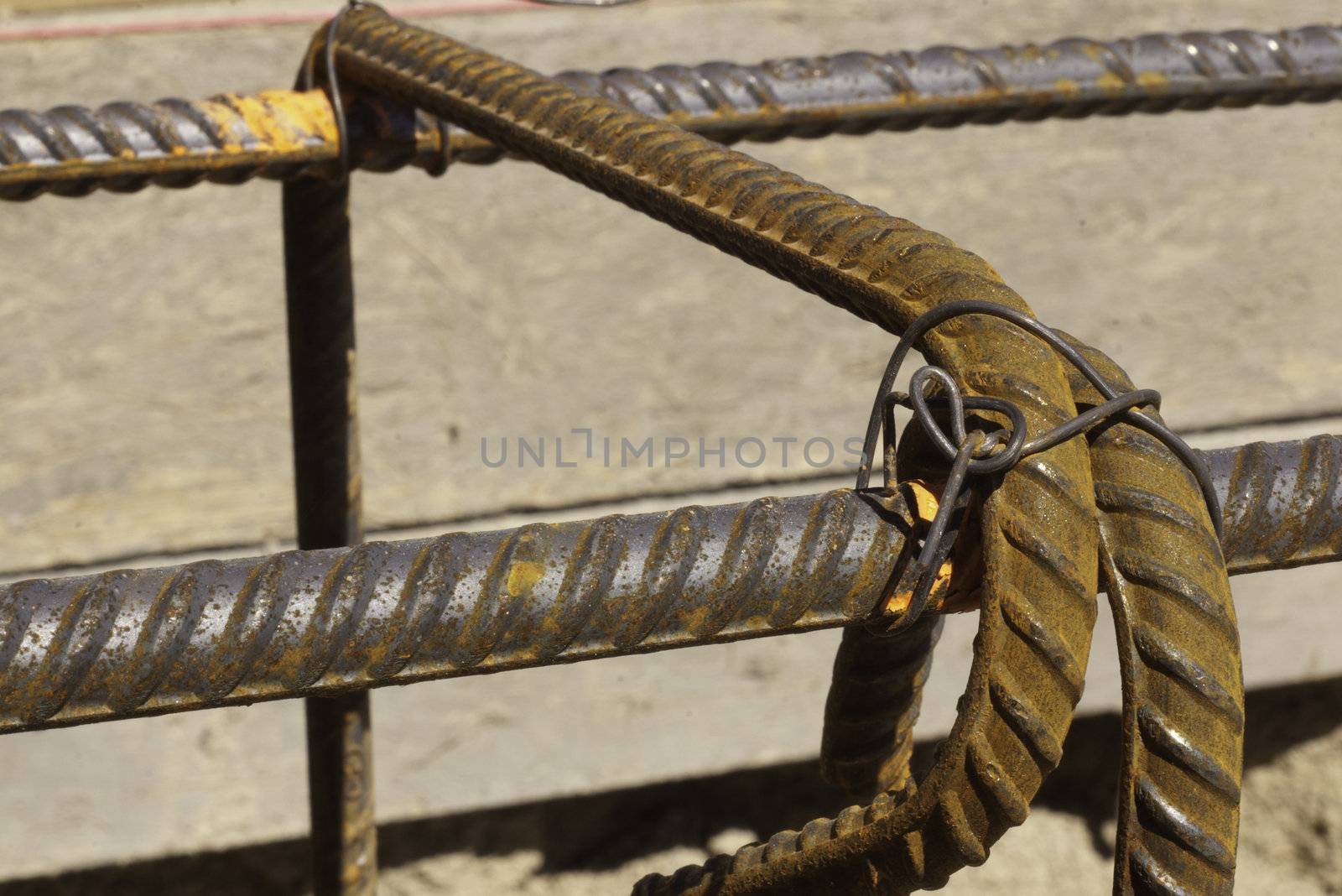 close up of rebar tied with tie wire for construction rusted