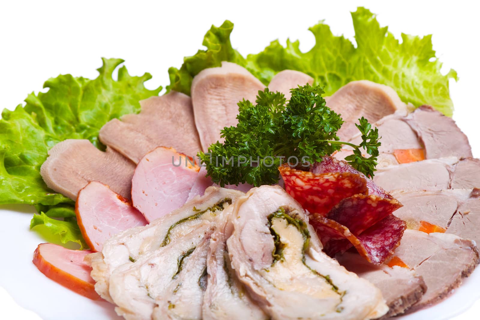 served with sliced ​​meat on a white plate, on a white background