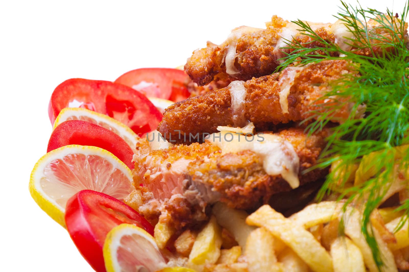 Fish fried in breadcrumbs with tomato and lemon by Pogost