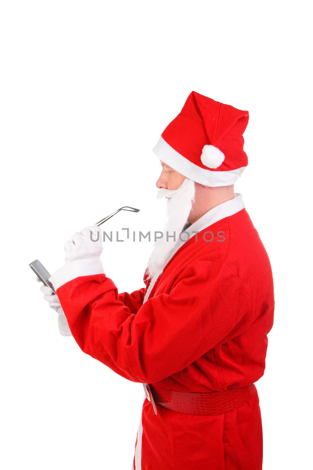 santa claus look on mobile phone. isolated on the white background