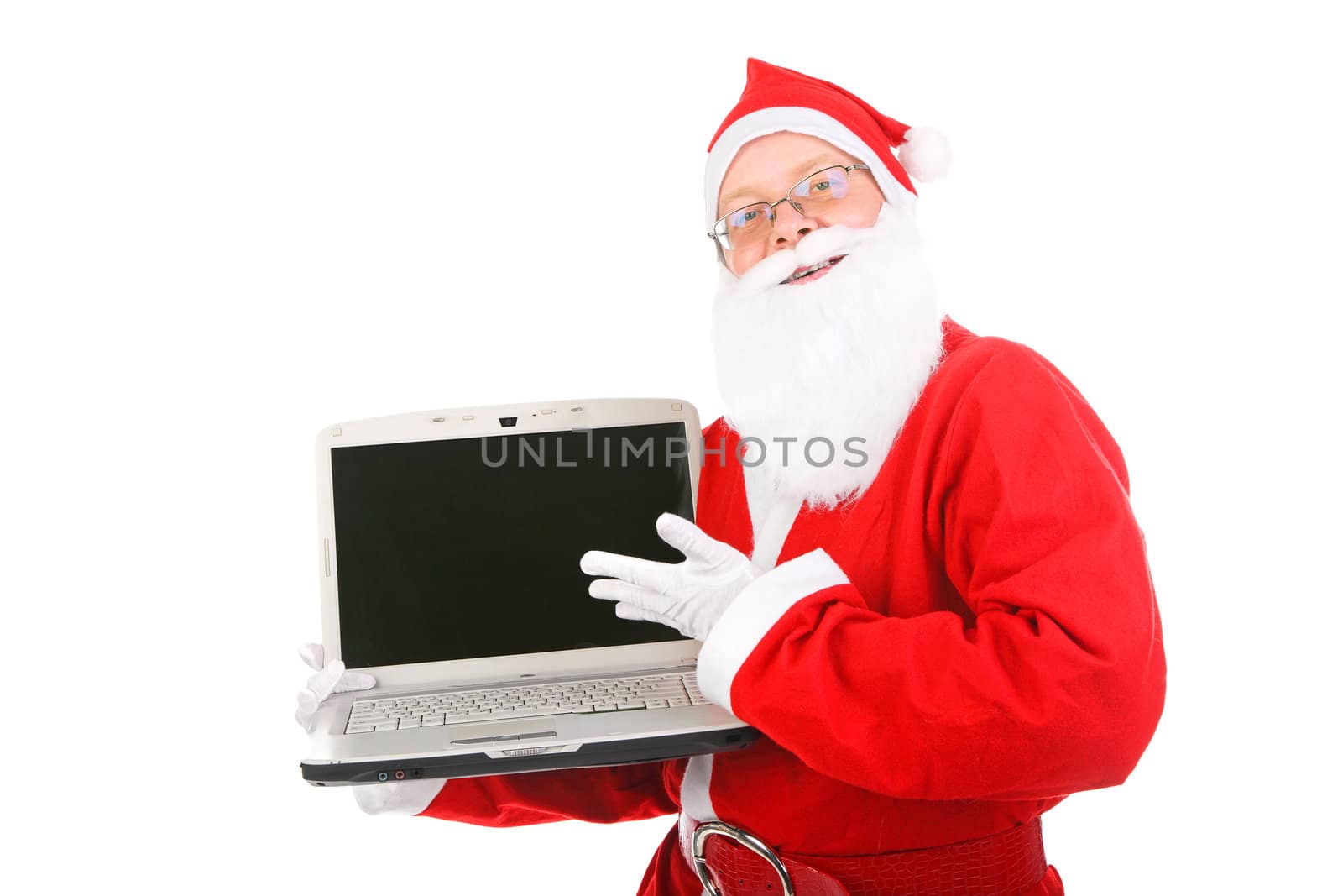 santa claus showing laptop computer with empty screen. isolated on the white background