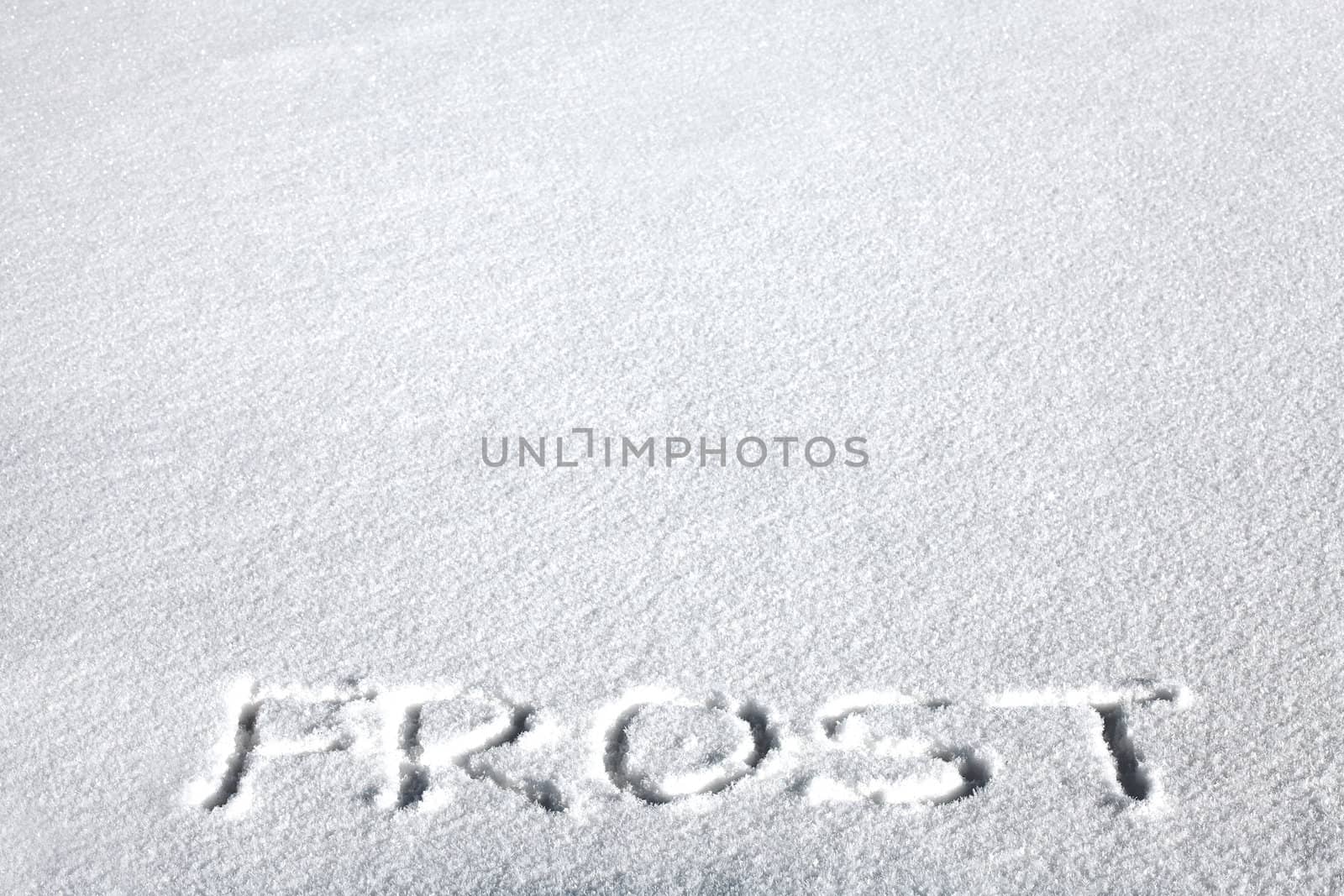 Handwritten Inscription "Frost" on the Snow