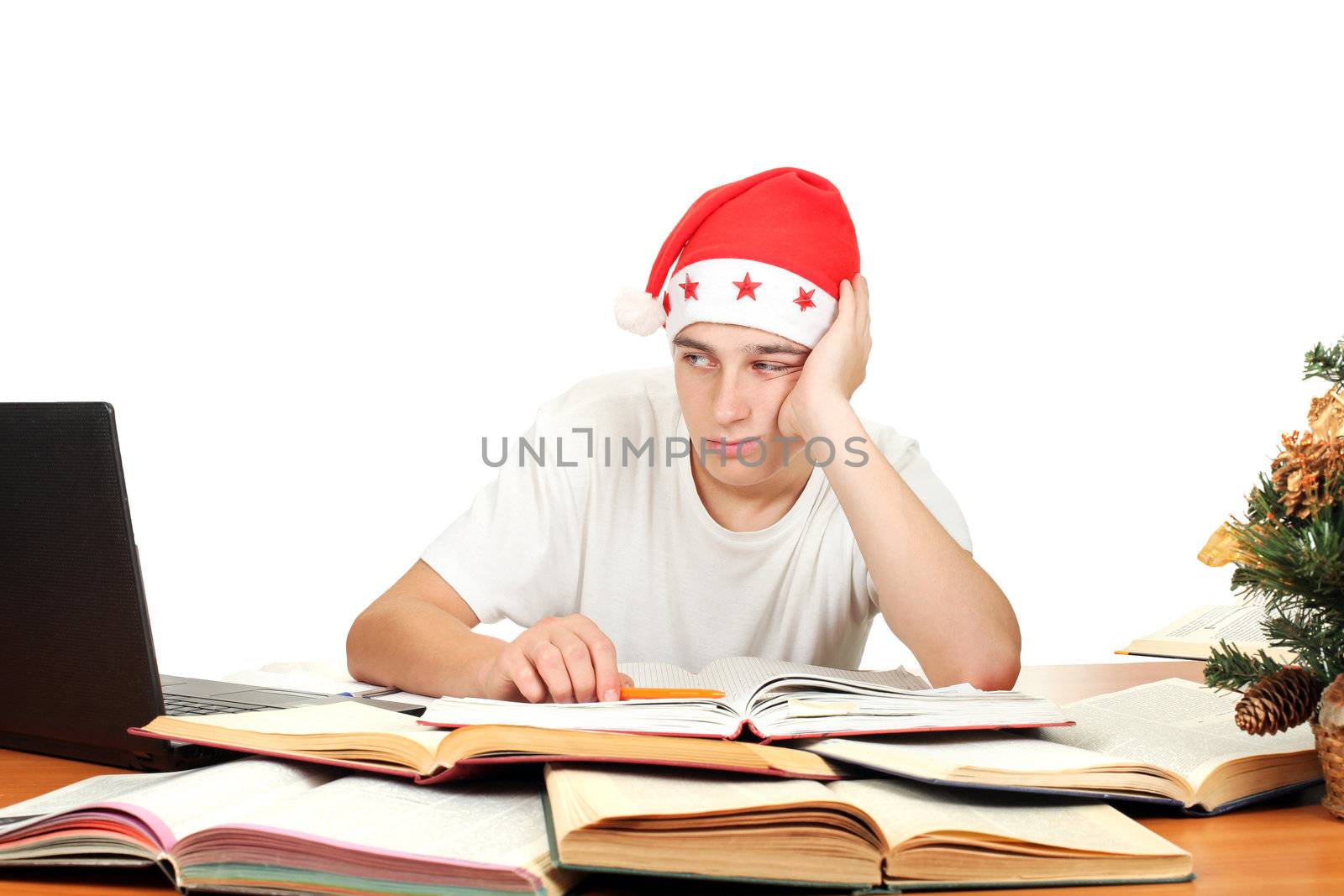 bored and tired student in santa's hat. isolated on the white background