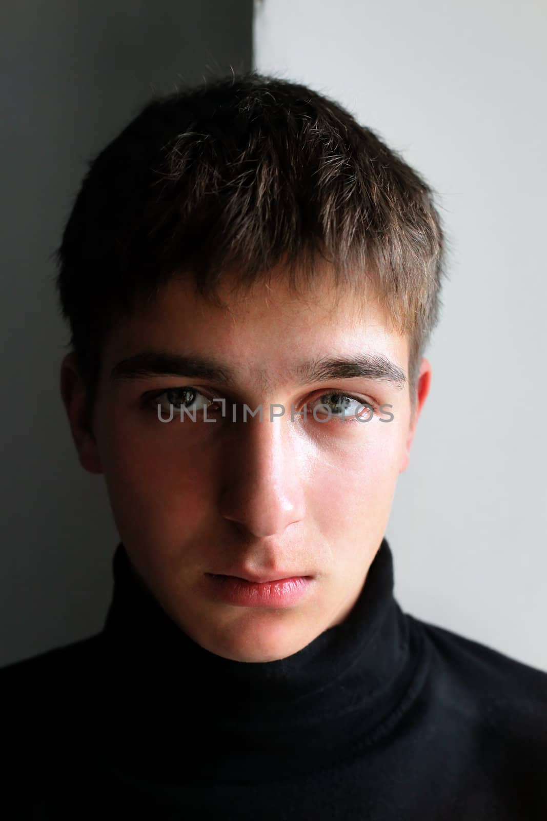 Serious Teenager Portrait by sabphoto