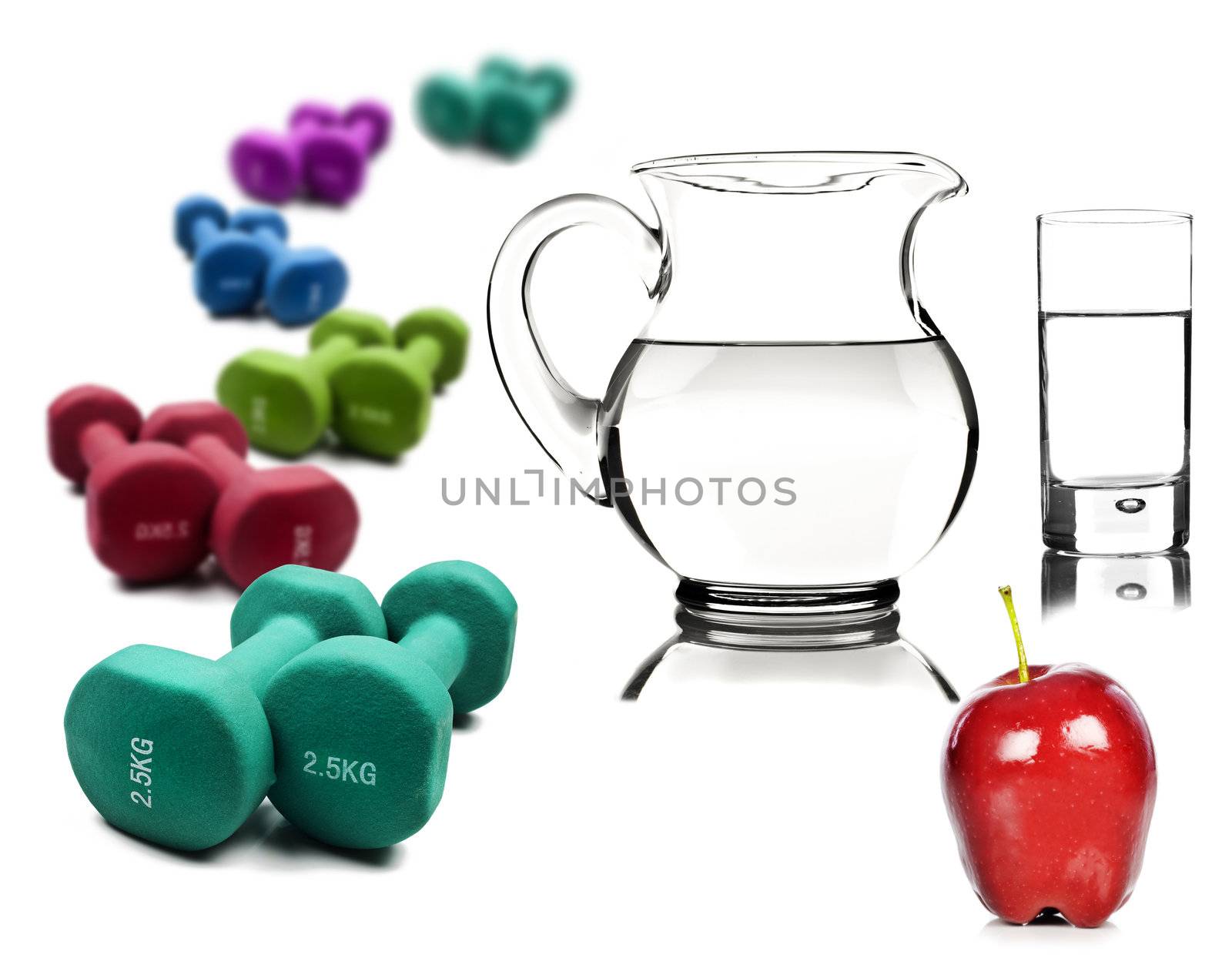 Healthy lifestyle - water in a pitcher and glass  apple with dumbbells by tish1