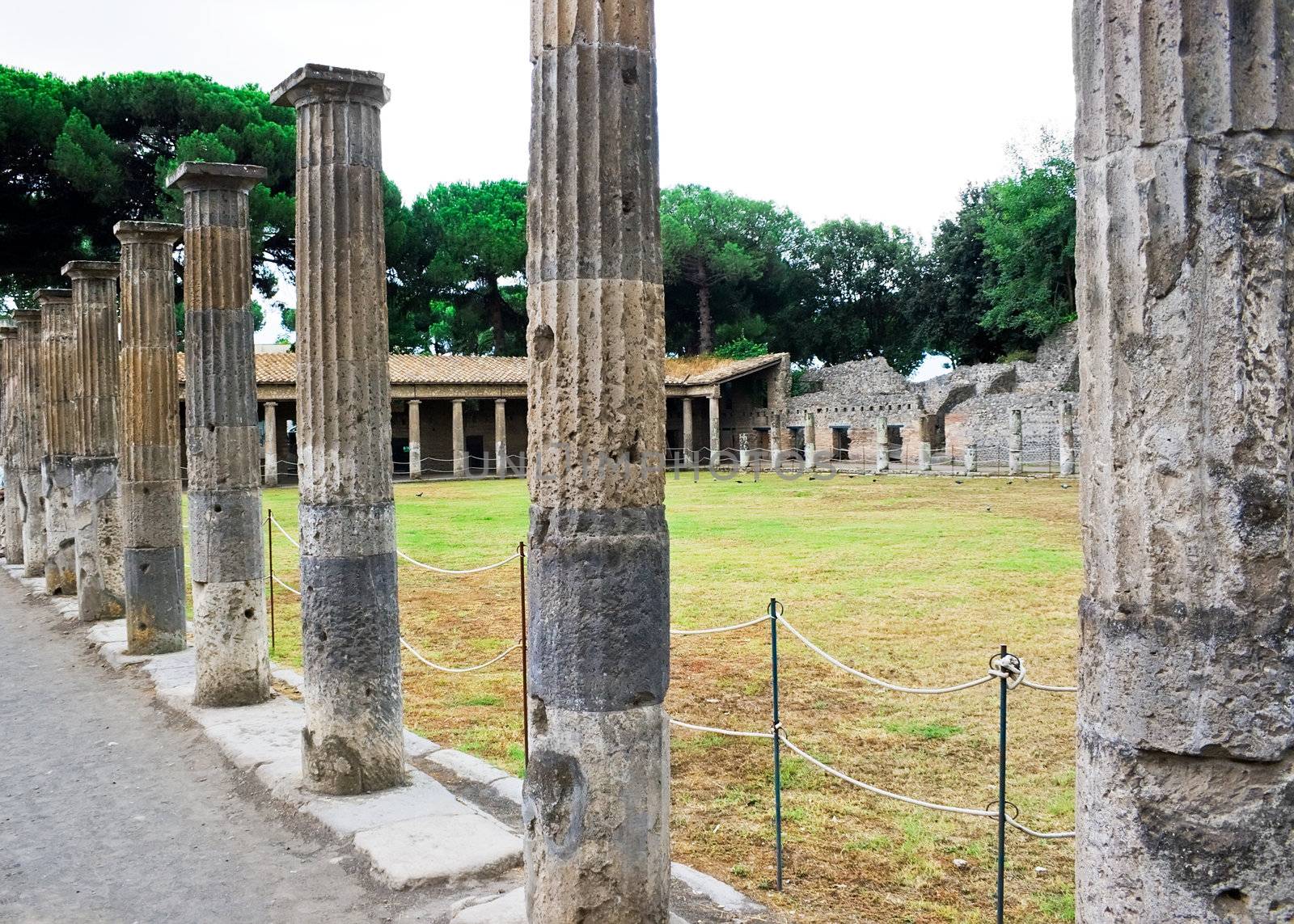 Ruins of ancient roman columns in Pompeii, Italy