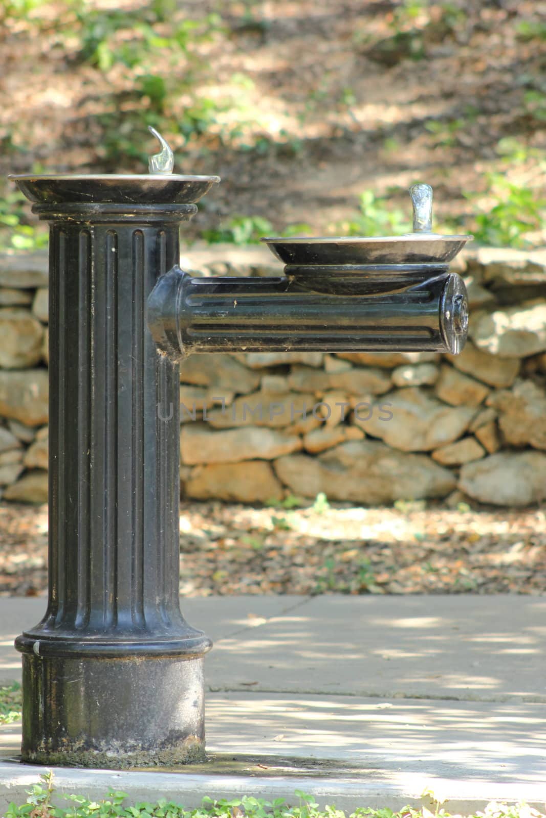 Antique water fountain at a park