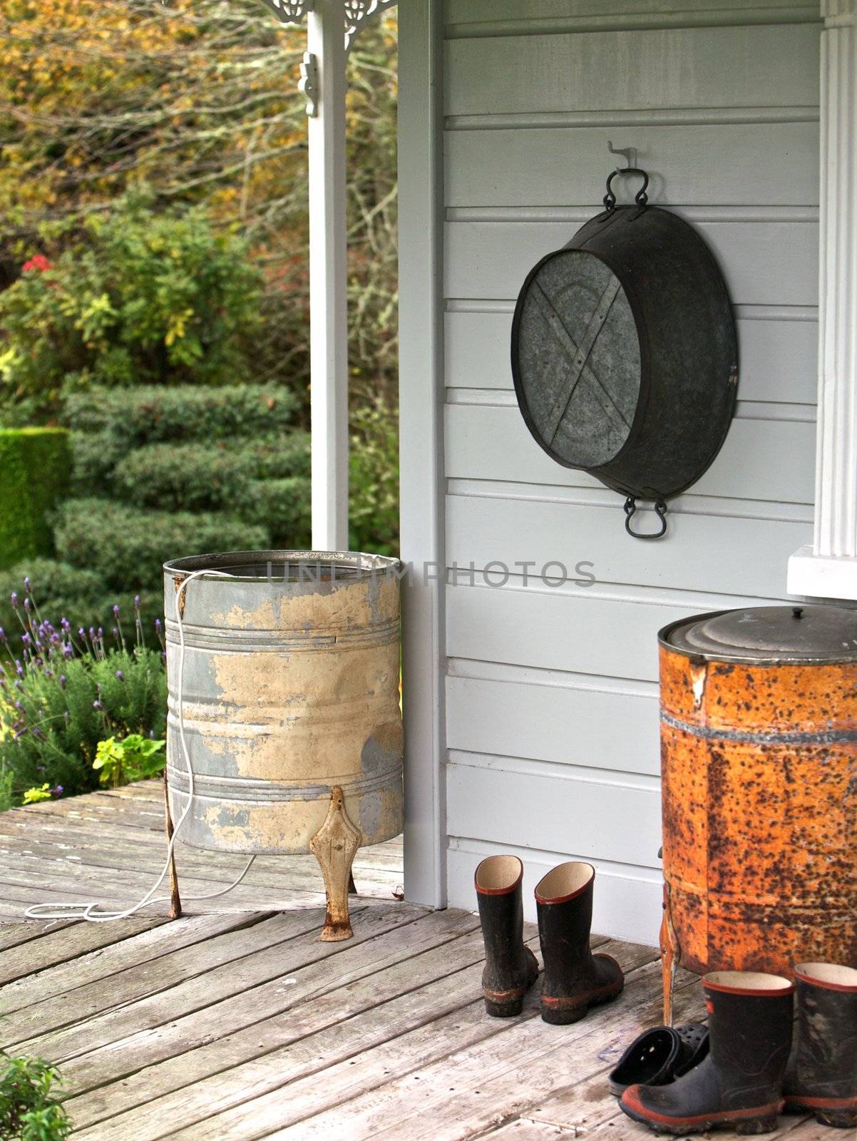 Farm Home with boots at entrance to the porch