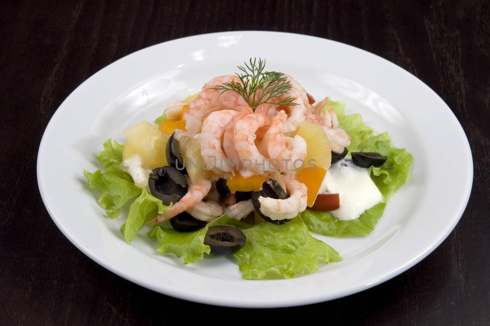 Prawn salad. Simple and healthy salad of shrimp, mixed greens, red  pepper and olive.