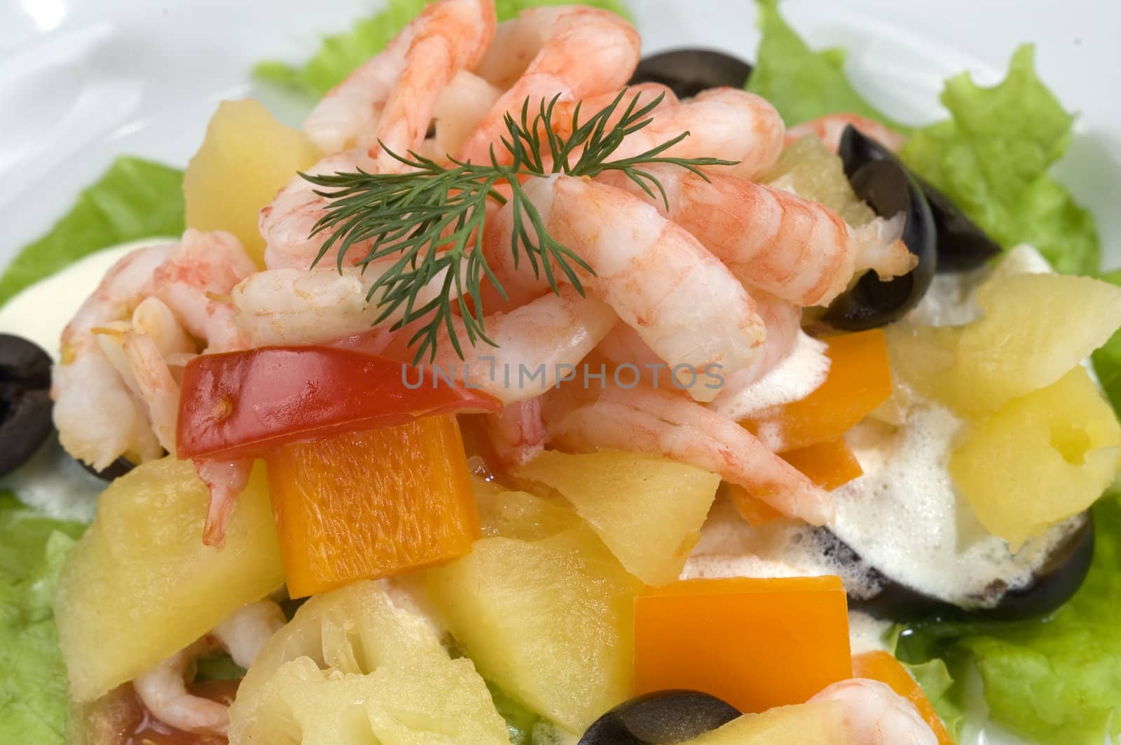Prawn salad. Simple and healthy salad of shrimp, mixed greens, red  pepper and olive.