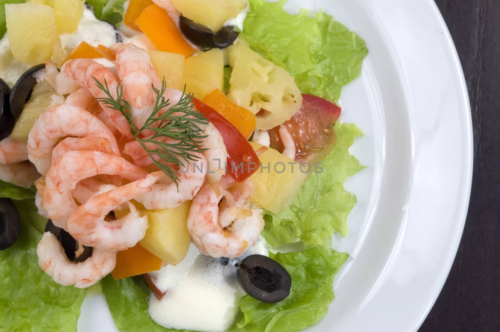Prawn salad. Simple and healthy salad of shrimp, mixed greens, red  pepper and olive.
