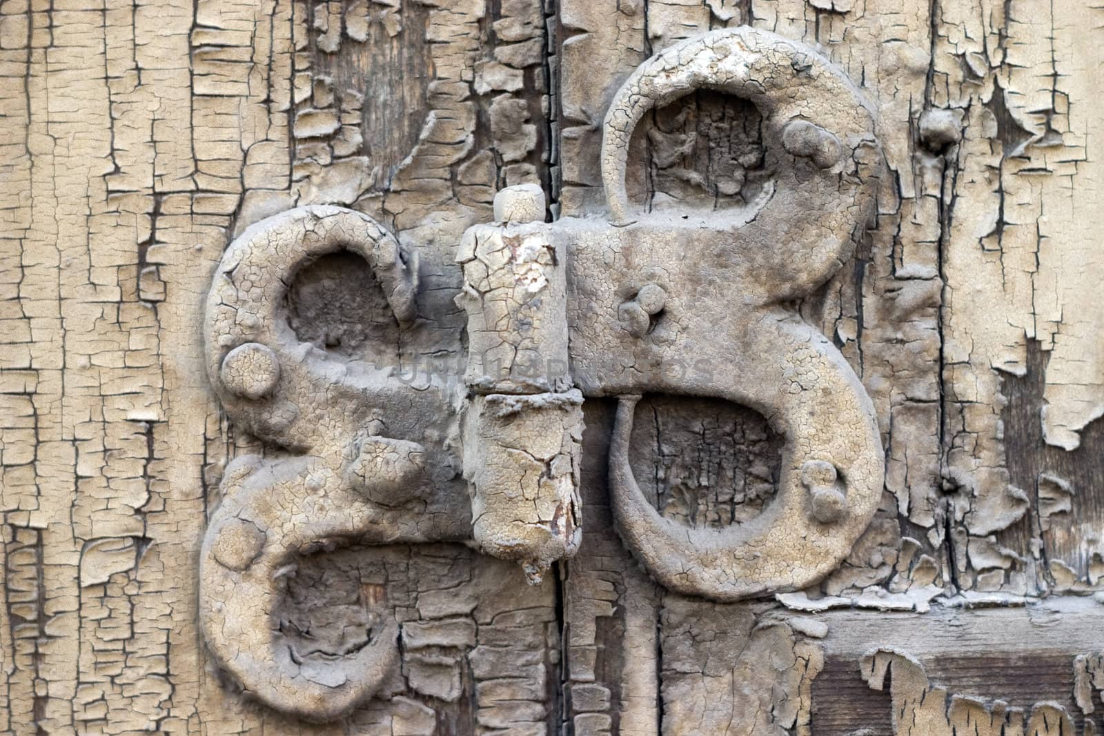 Old metal details on an old board.