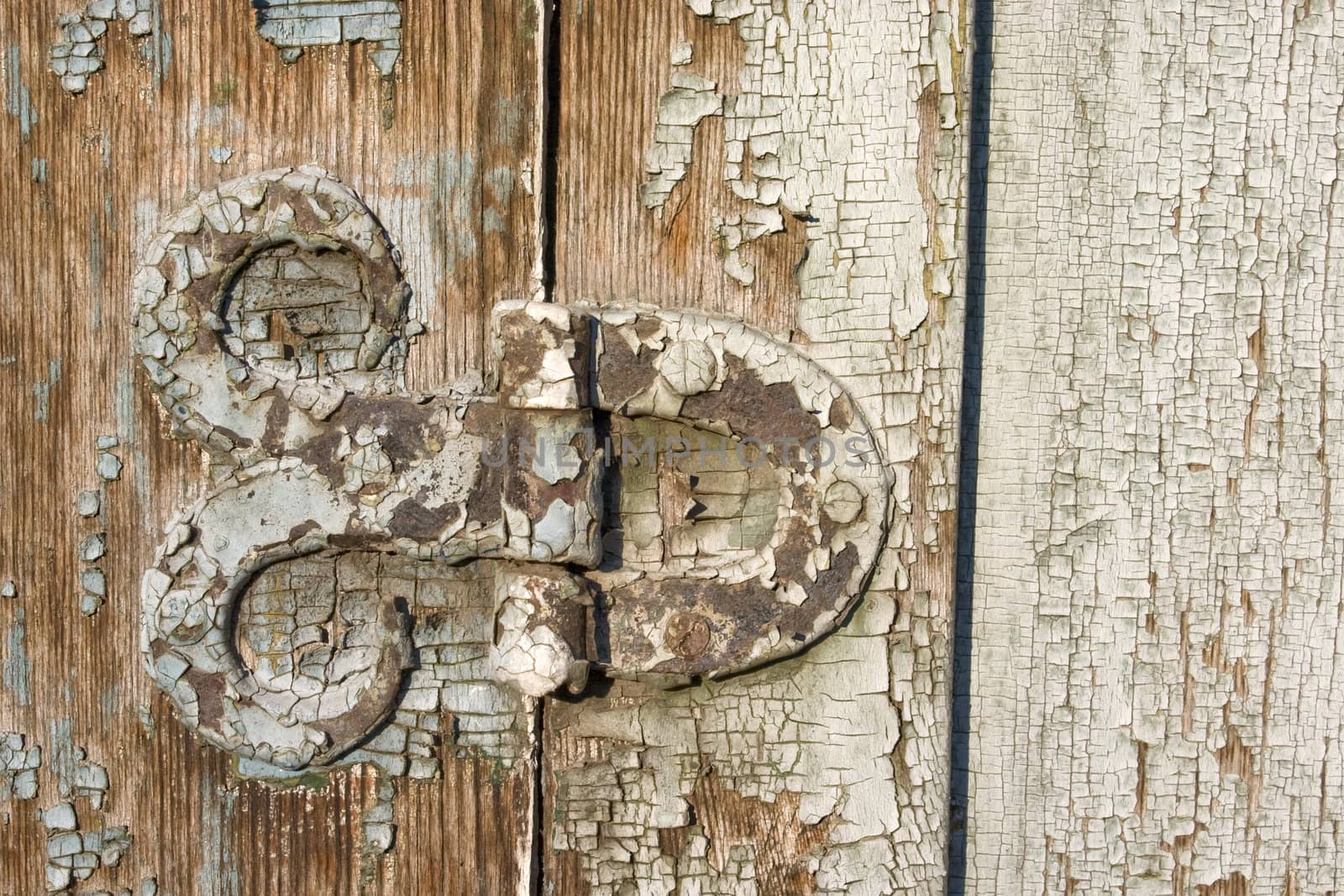 Old metal details on an old board.