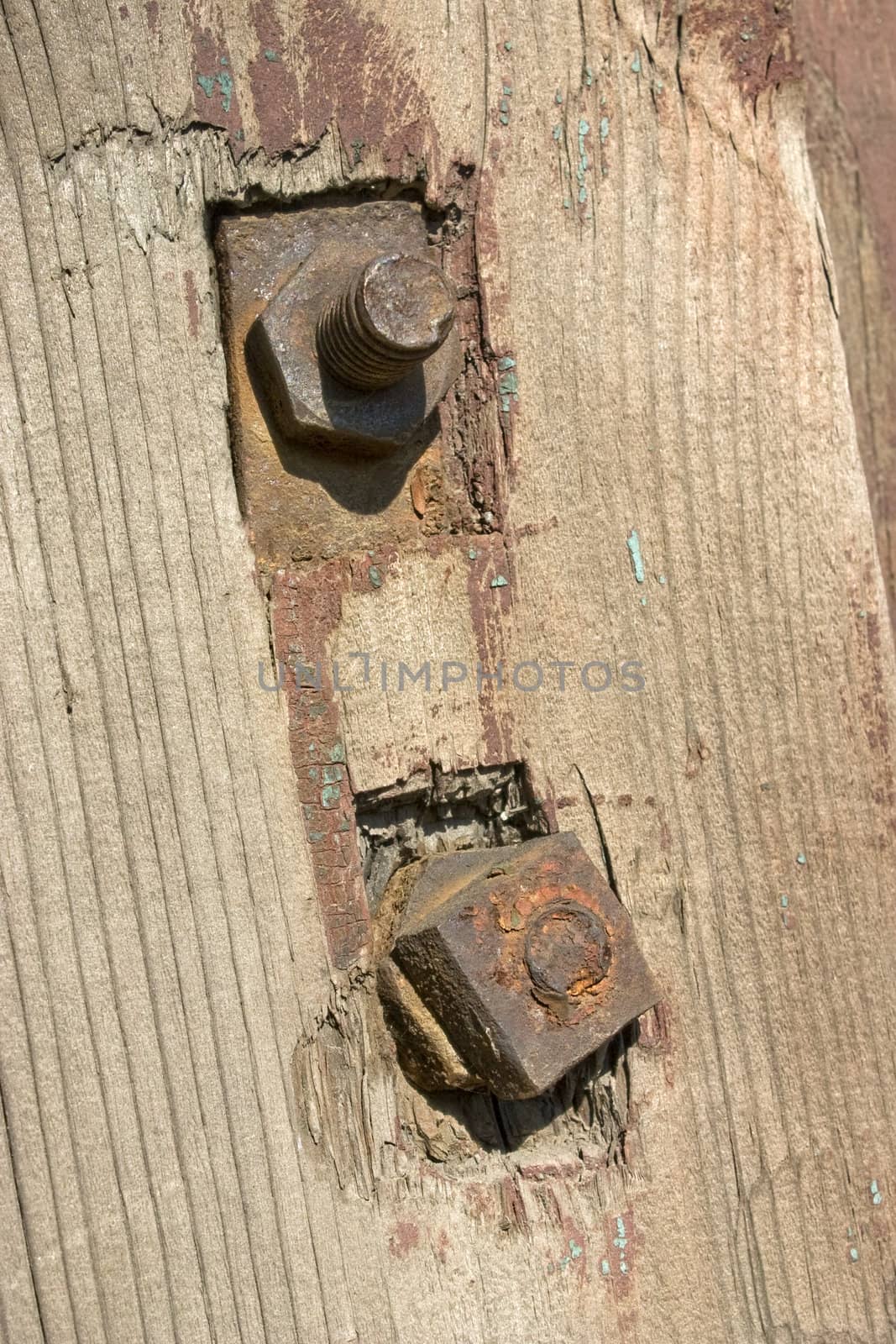 Old metal details on an old board.