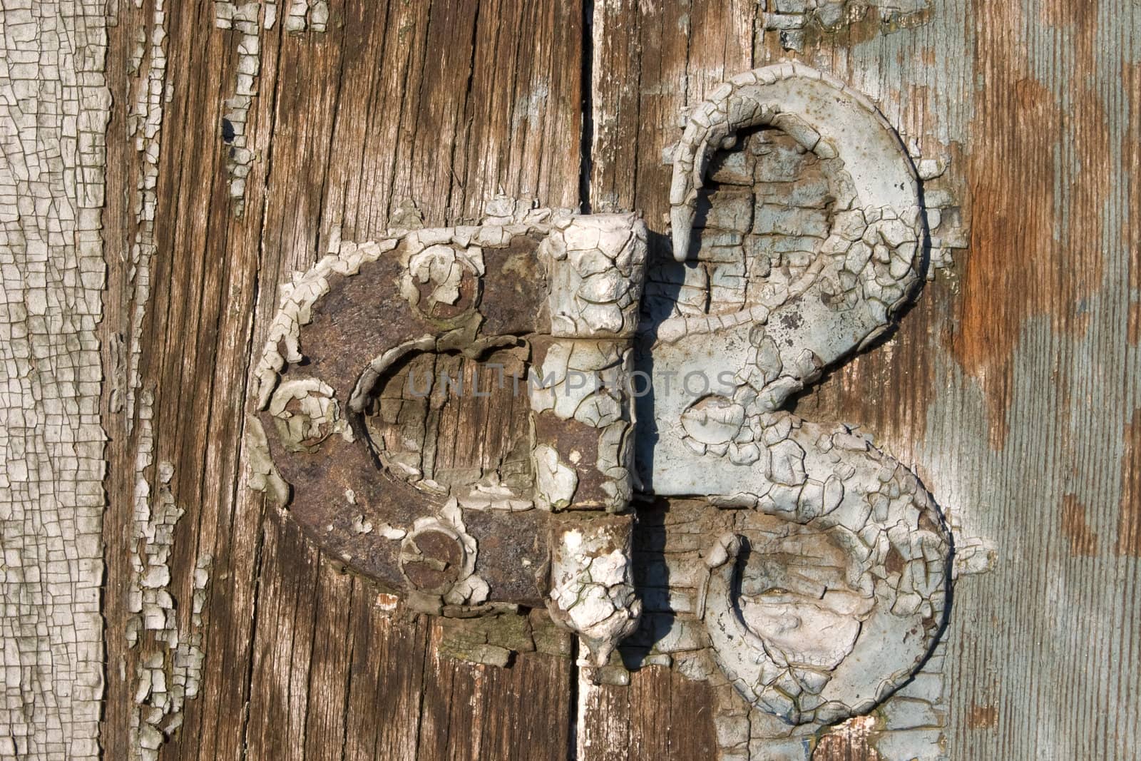 Old metal details on an old board.