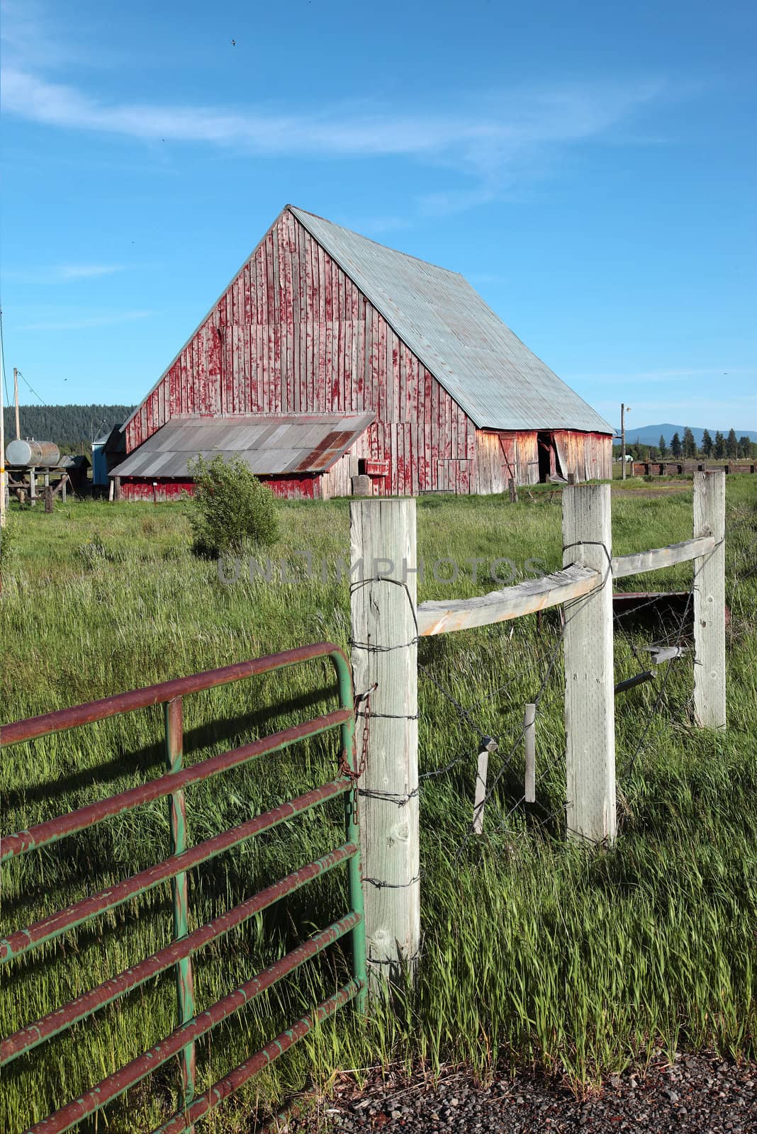 Old barn and fence in rural south Oregon Klamath Falls region.