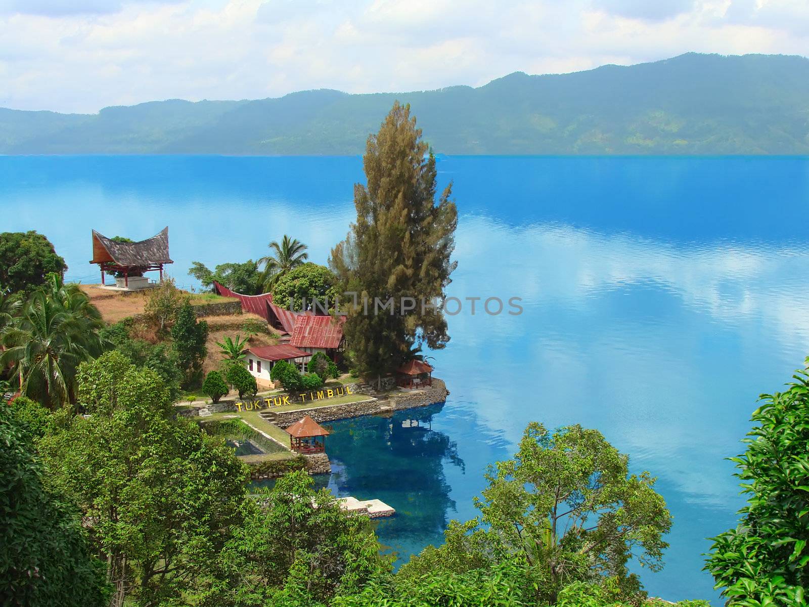   Lake Toba (Indonesian: Danau Toba) is a lake and supervolcano. The lake is 100 kilometres long and 30 kilometres wide, and 505 metres (1,666 ft) at its deepest point.                                   