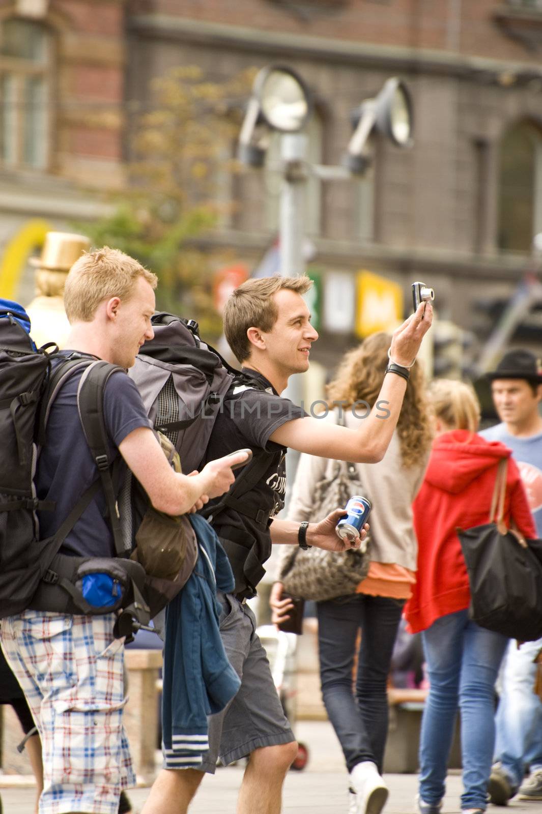 Young tourists on the street of Helsinki, Finland