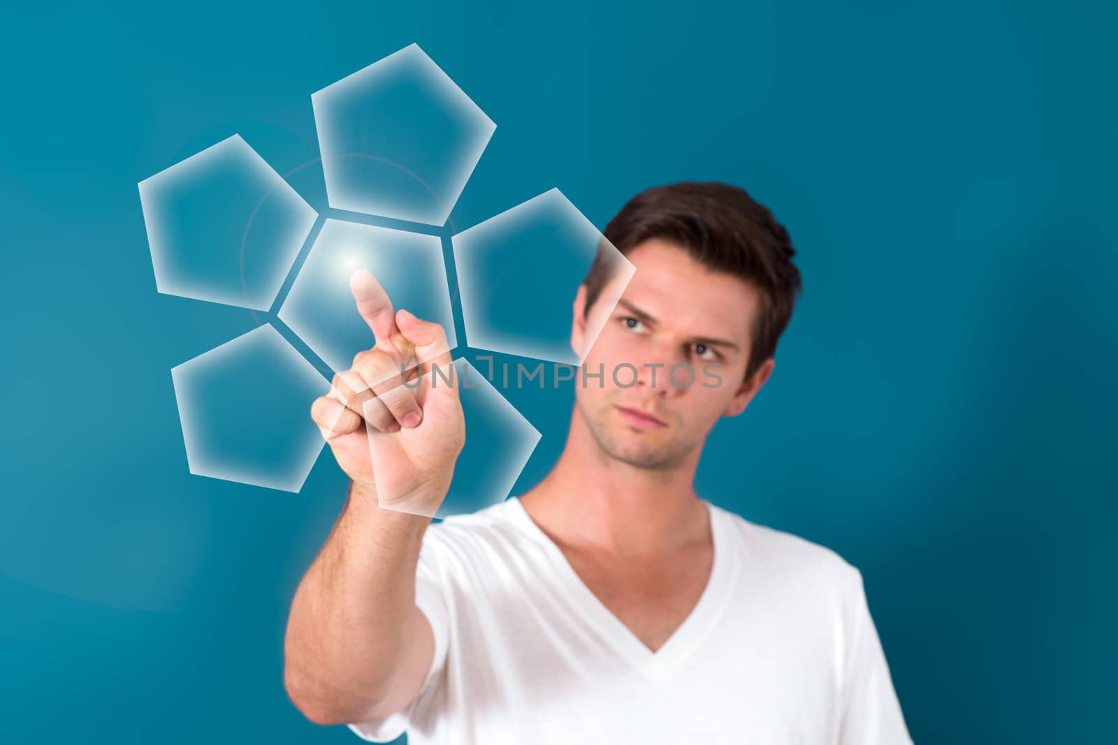 Brunette man Pressing Virtual Button with a blue background