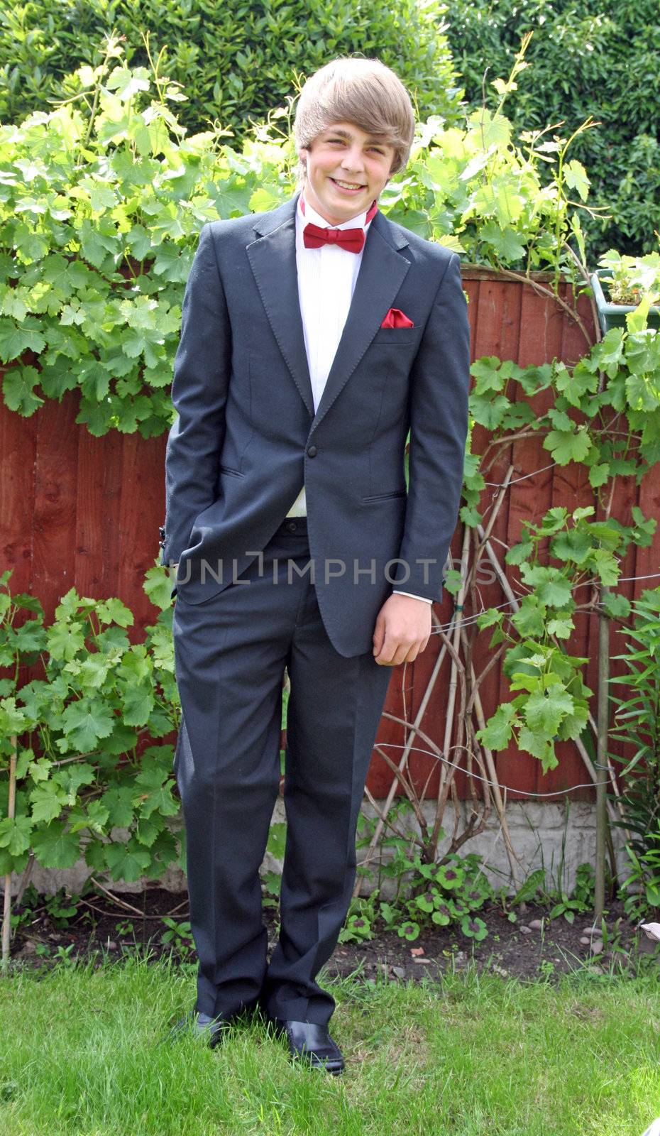 teenager in prom suit