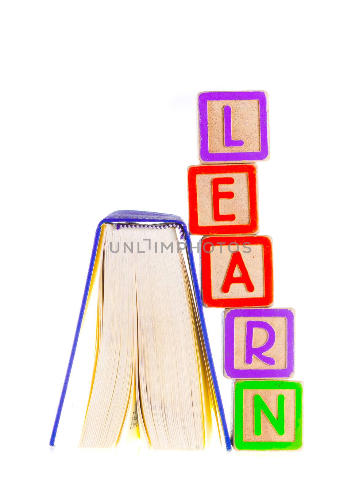 Learn Spelled Out Leaning on Open Book