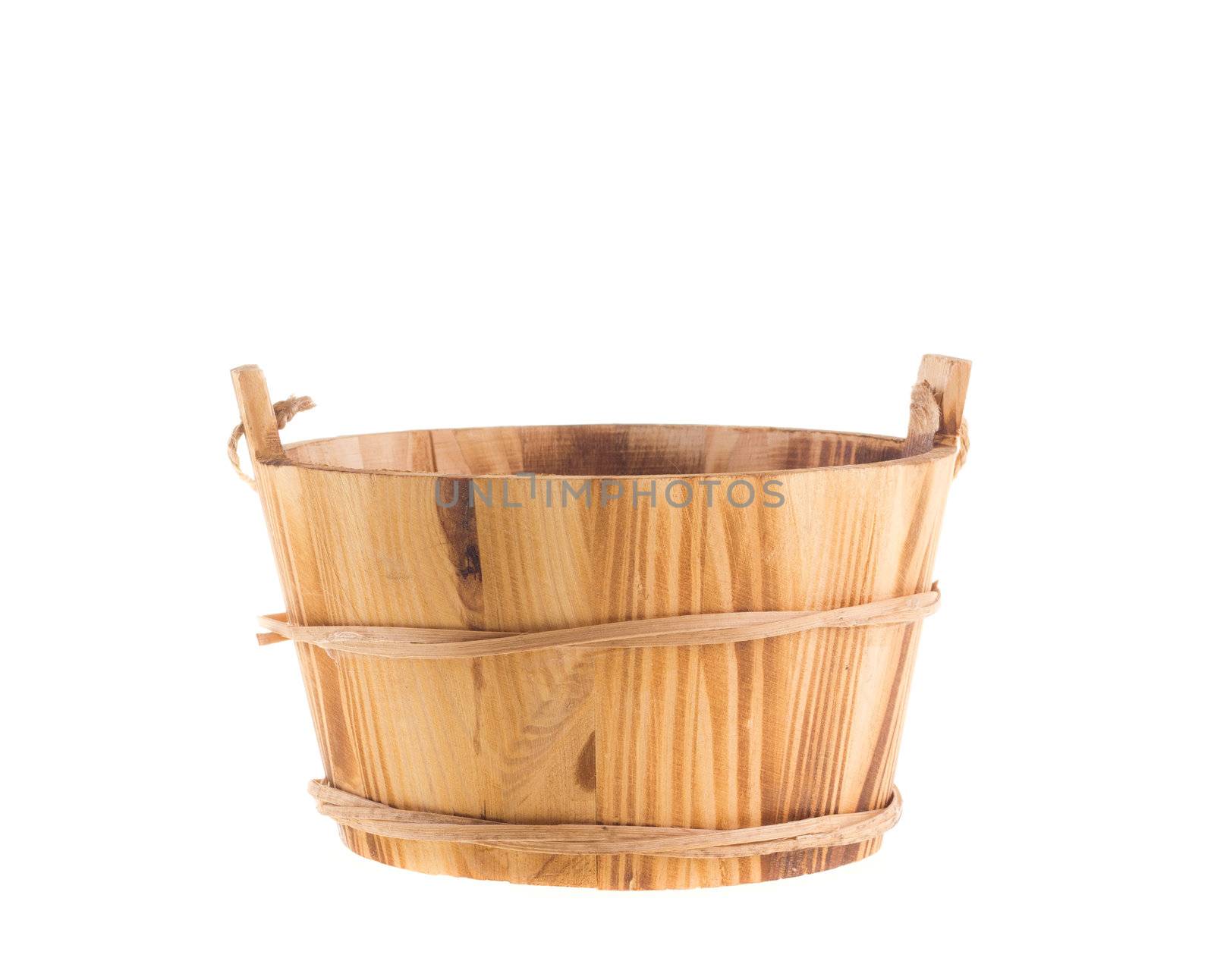 Wooden bucket isolated over white background