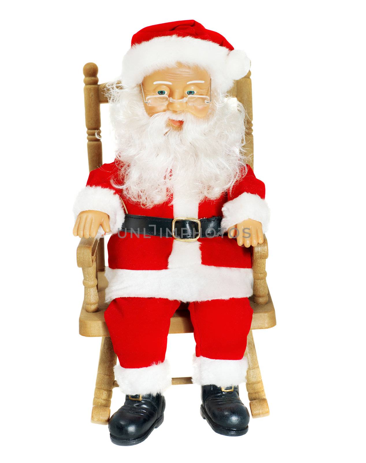 Santa Claus in chair figurine, isolated on white