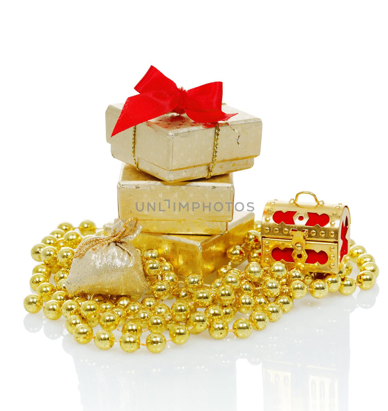 Christmas gifts in a brilliant box with decoration, isolated on white 