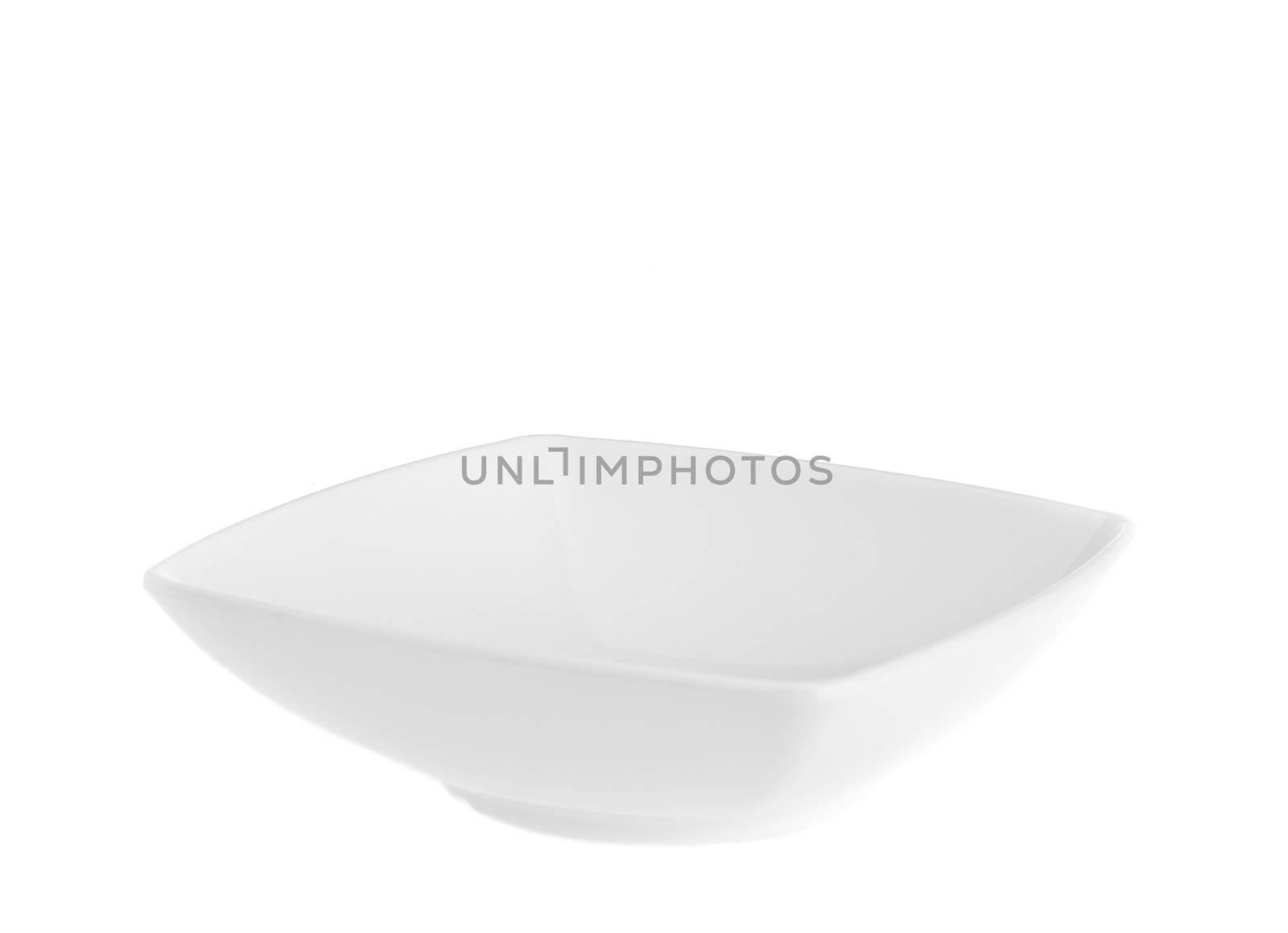 Stack of plain white dinner plates isolated on white background