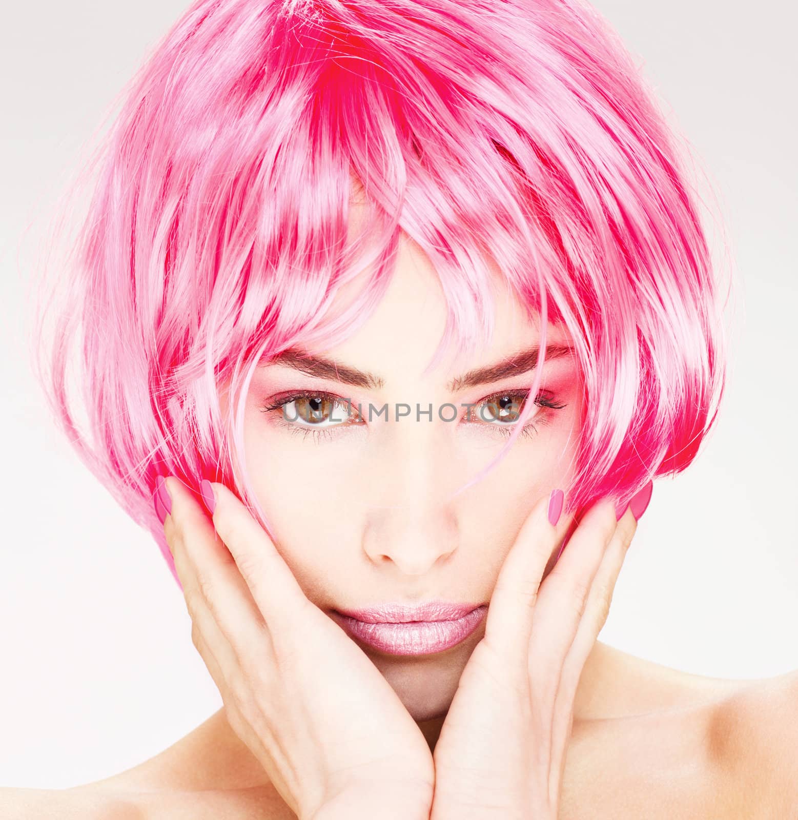 Portrait of a pretty young pink hair woman