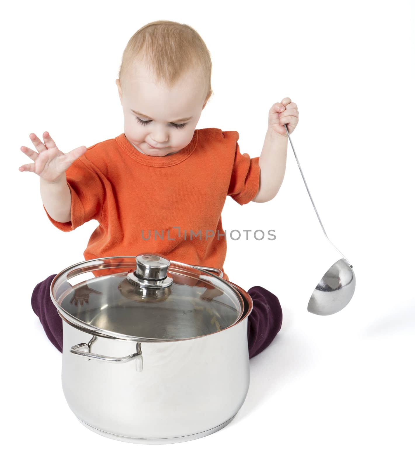 baby with big cooking pot isolated on white background
