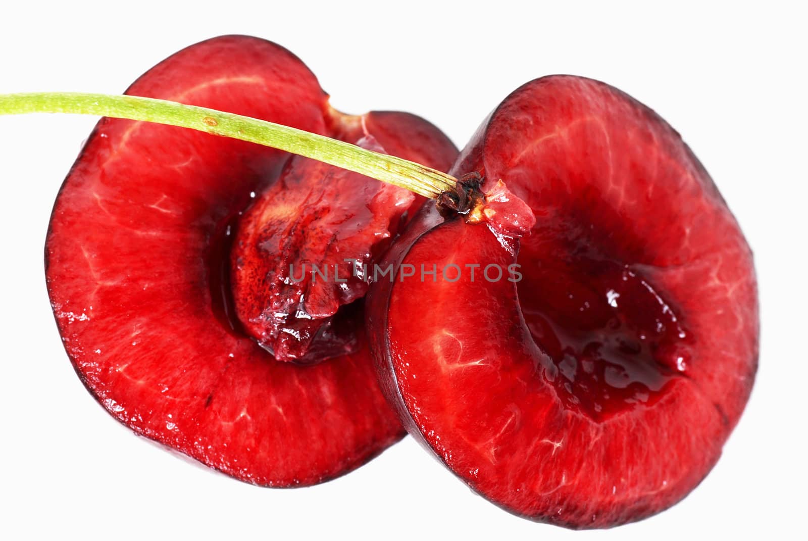 one ripe red cherry on white background