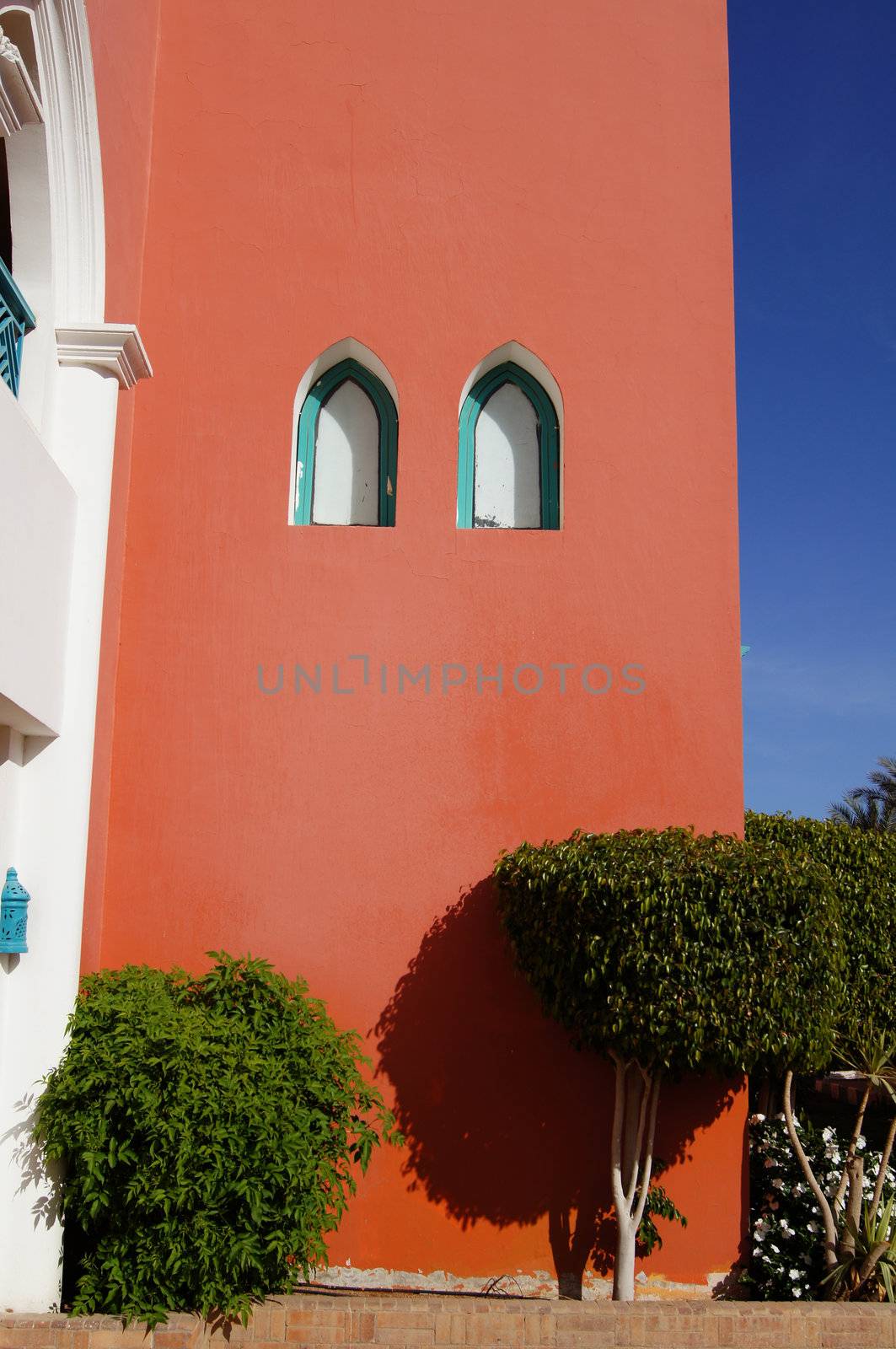 Arabic architecture: red walled building               