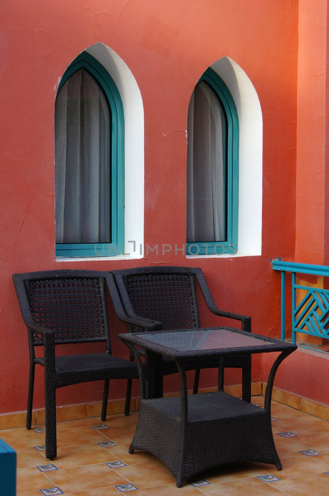 Arabic architecture: terrace with table and chairs            