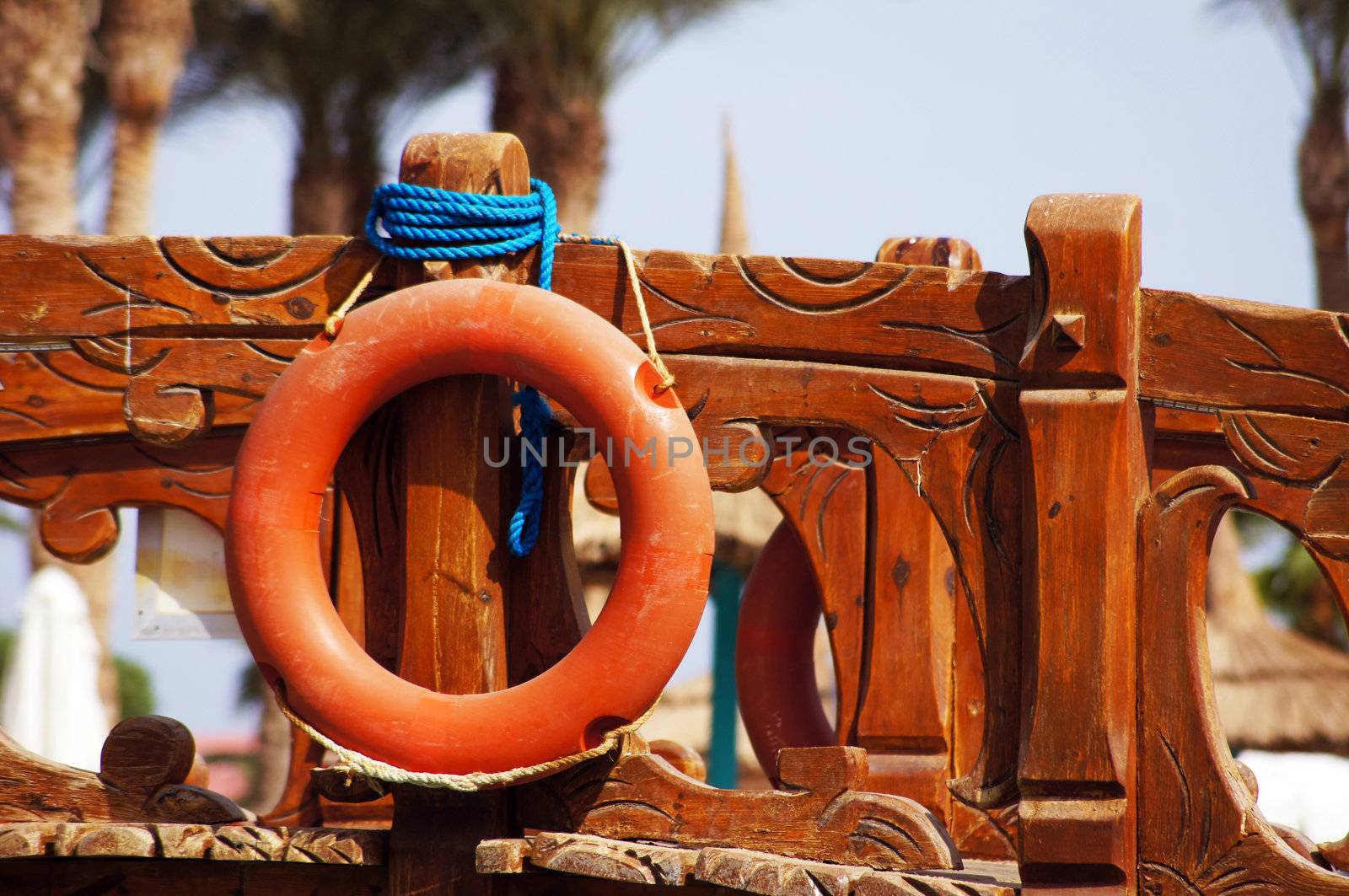 Close up of orange colored life buoy                