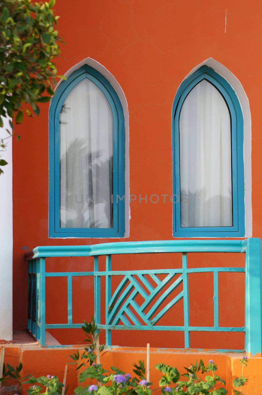 Arabic architecture: two windows and terrace                