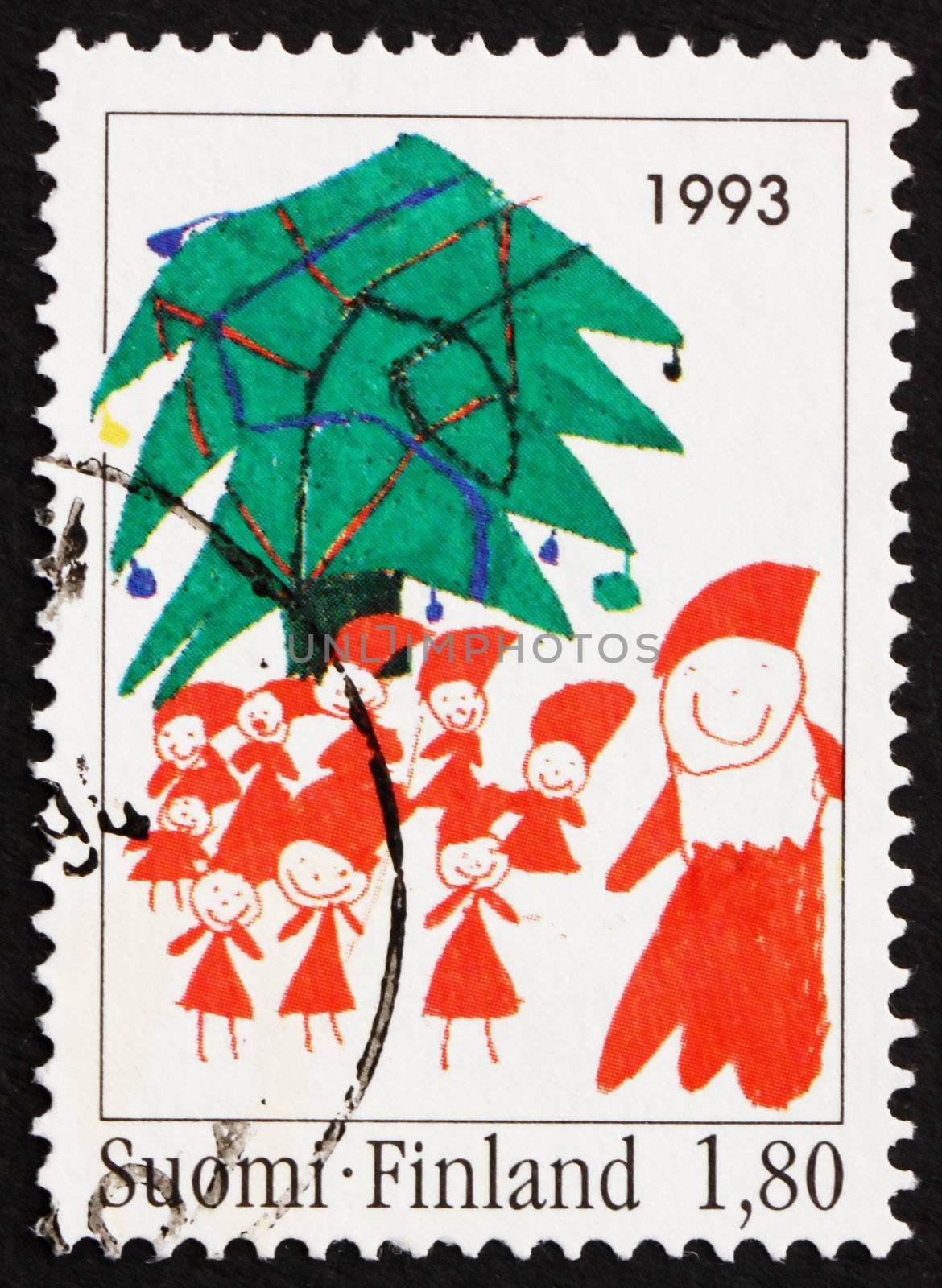 FINLAND - CIRCA 1993: a stamp printed in the Finland shows Santa and Christmas Tree, Children�s Drawing, Christmas, circa 1993