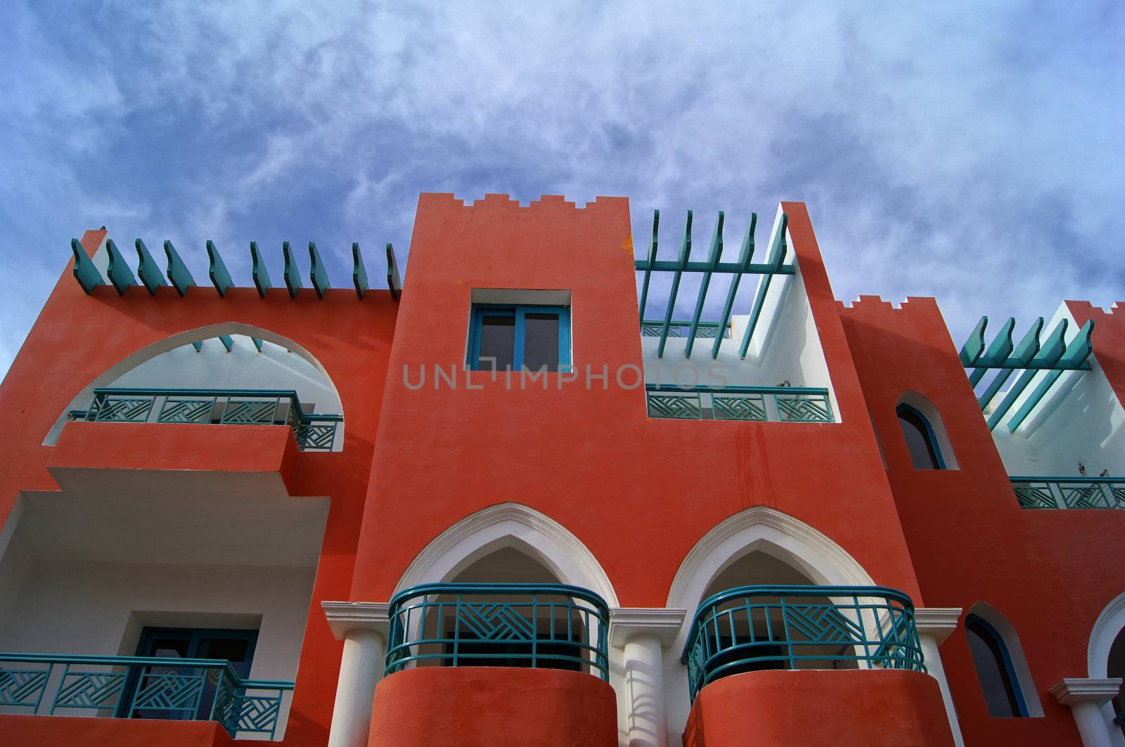 Arabic architecture: red walled building        