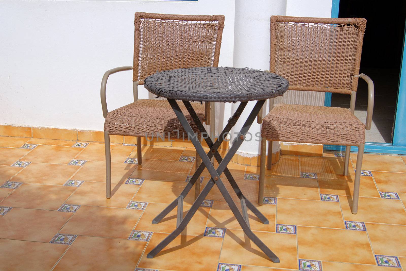 Close up of table and chairs in the patio         