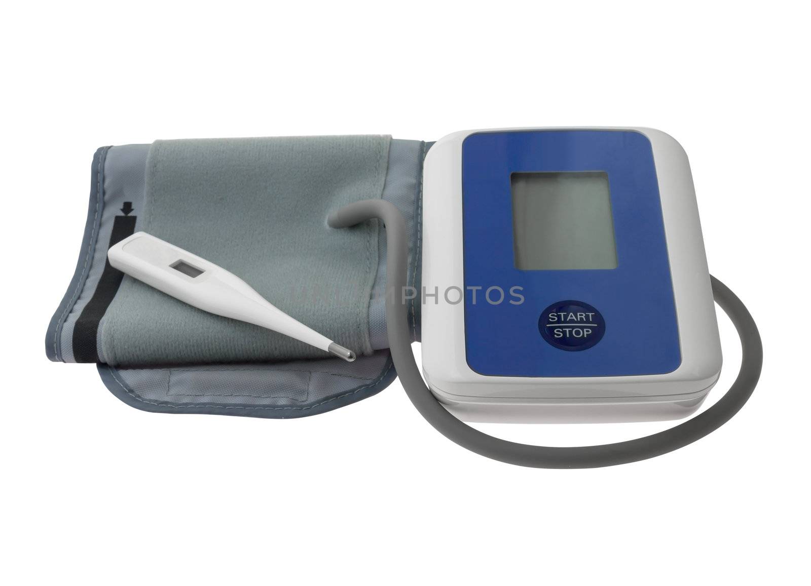 Blood pressure monitor  and blister capsule on white background