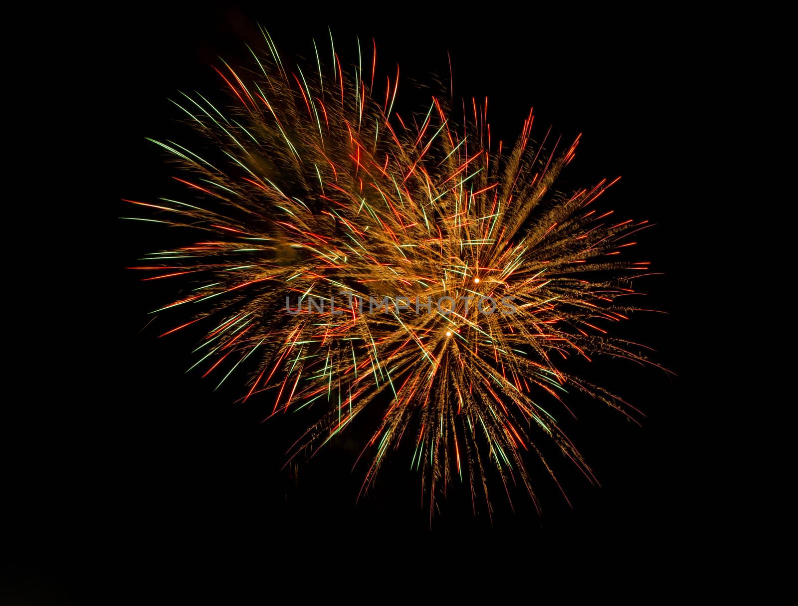 Centered image of exploding fireworks. can add more copy space in any direction due to it's isolated black background which would allow you to add your own text