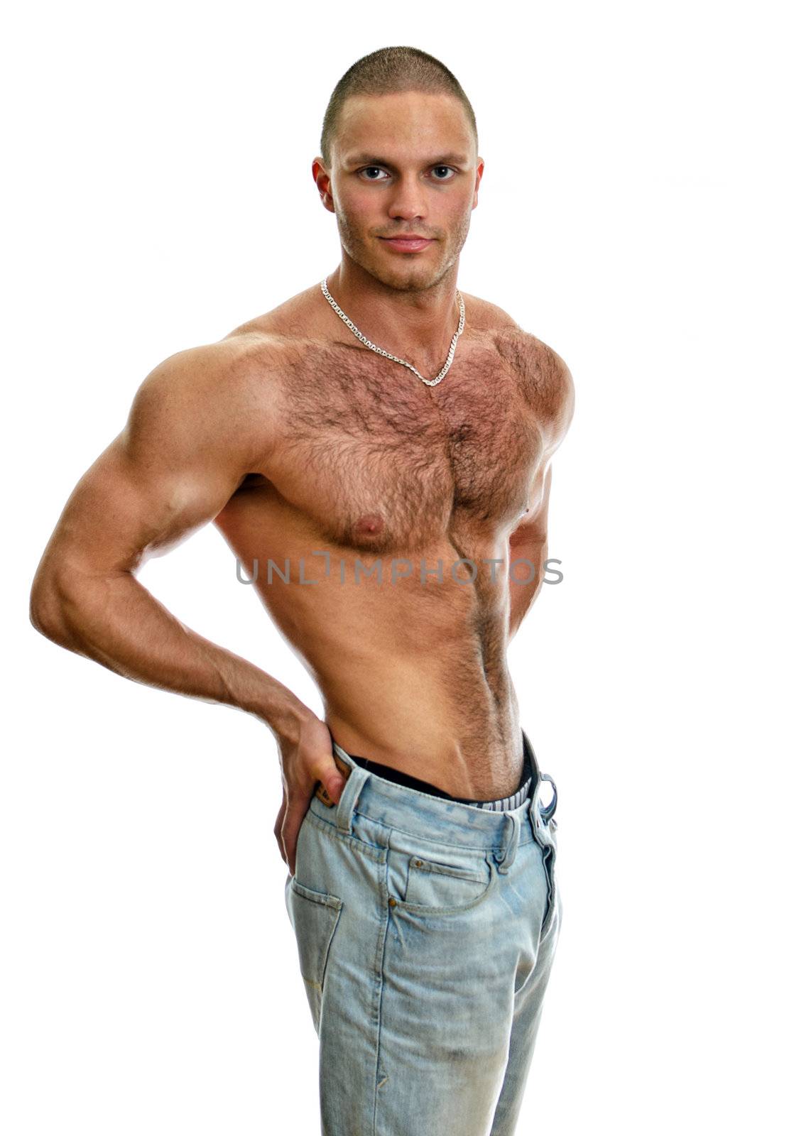 Attractive shirtless male in jeans, isolated on white