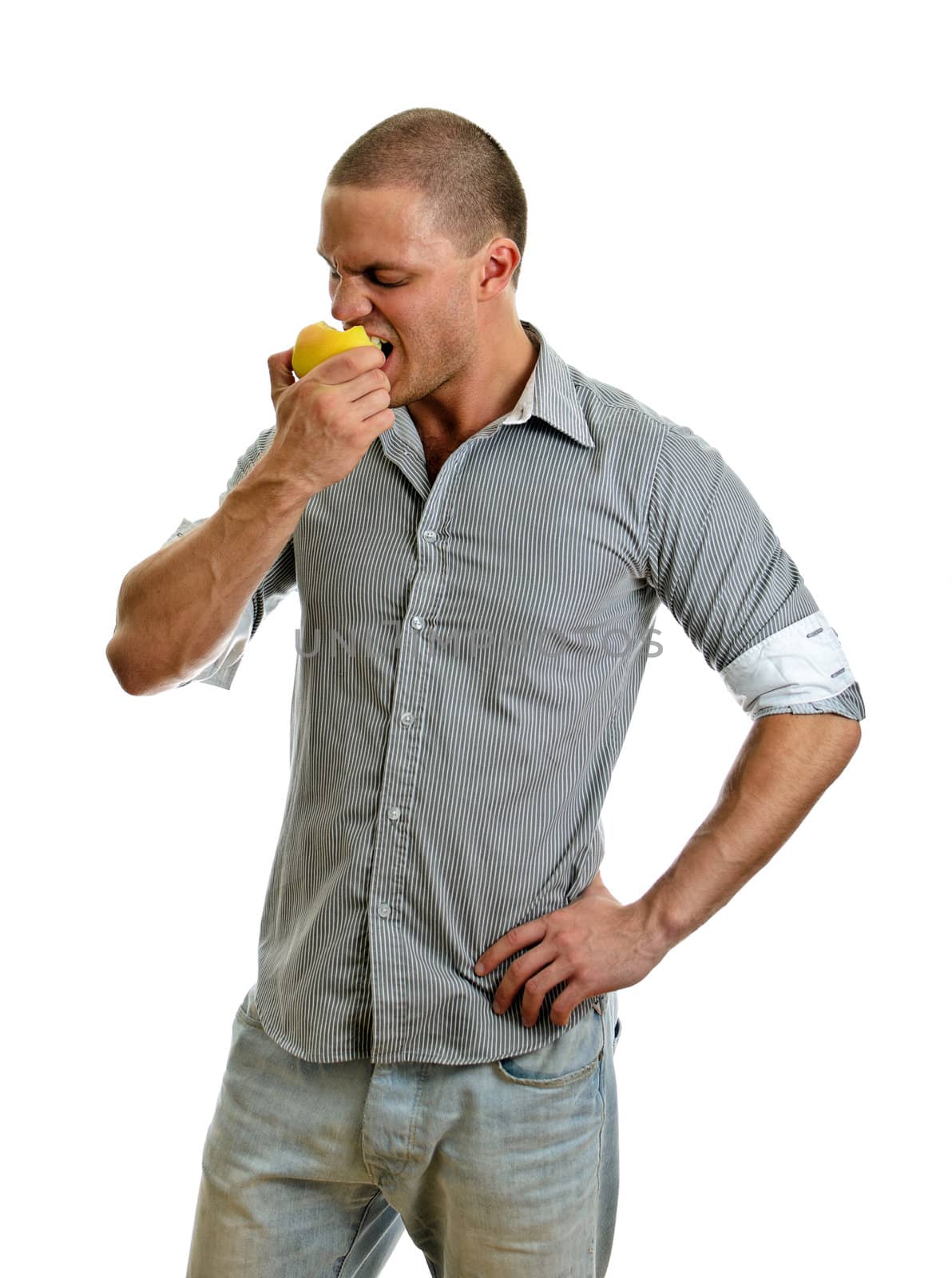 Man eating an apple. Isolated on white.