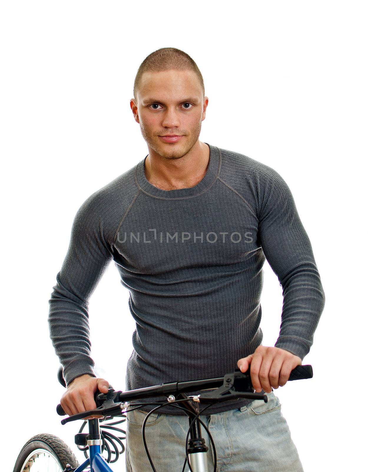 Sporty male with bicycle. Isolated on white.