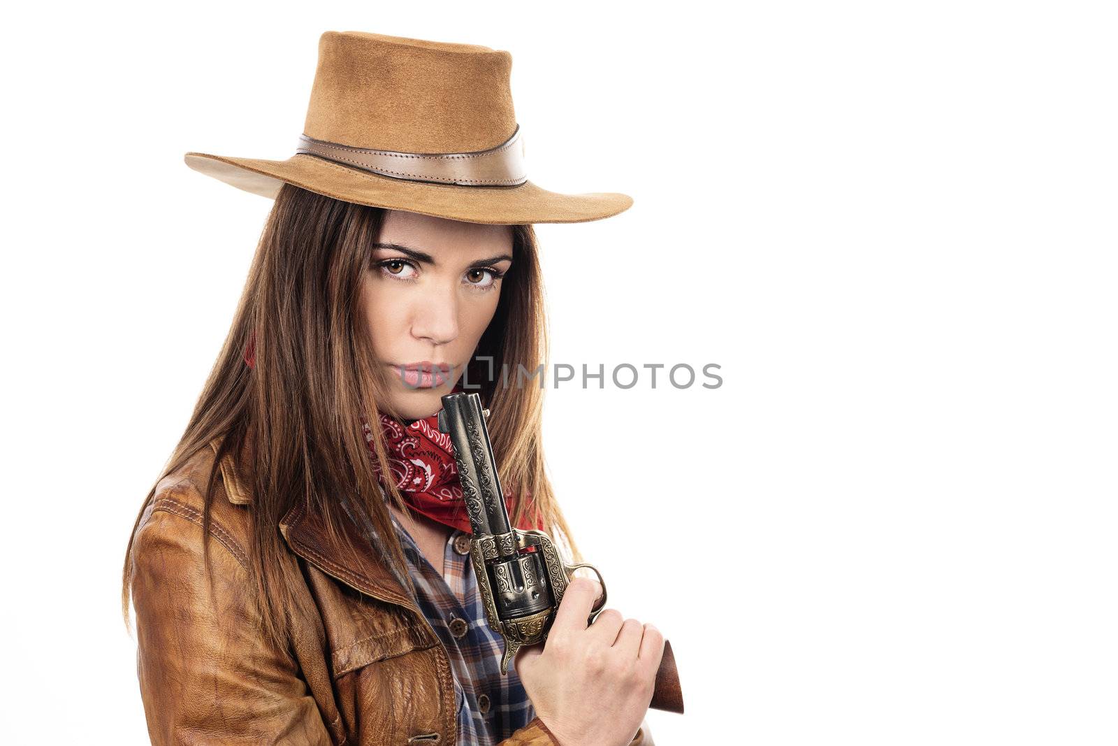 Beautiful cowgirl with gun on white background